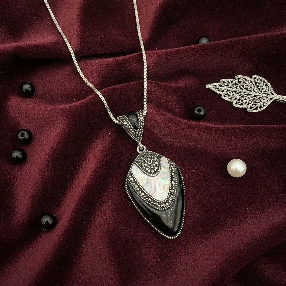 Silver Black Onyx , mother of pearl, and Marcasite accents Matinee Length​​​